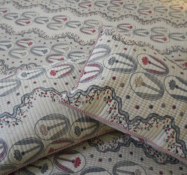 cream quilted kantha print reversible bedcover | pillow view