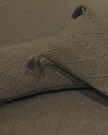 olive knitted bedcover | pillow view